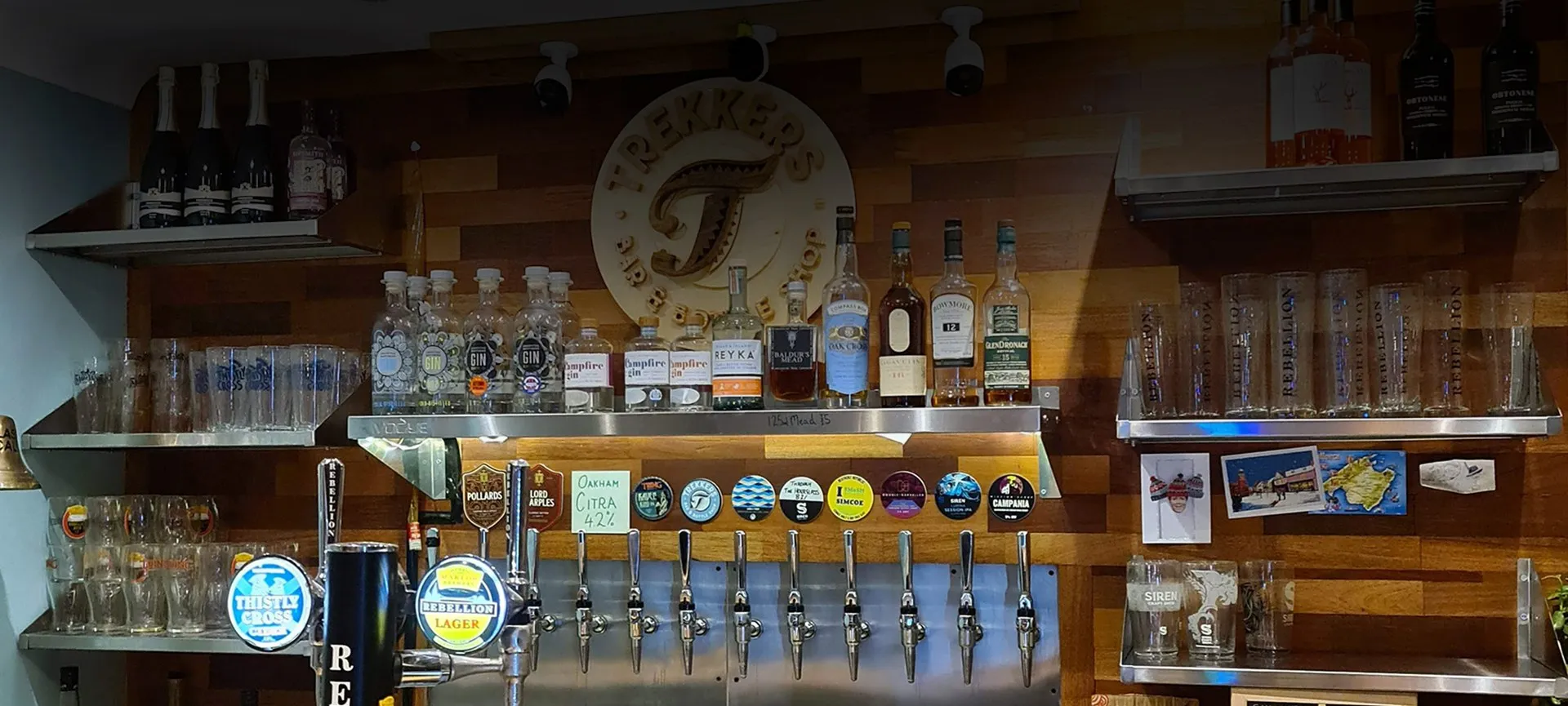 The back bar with the wooden Trekkers sign and taps