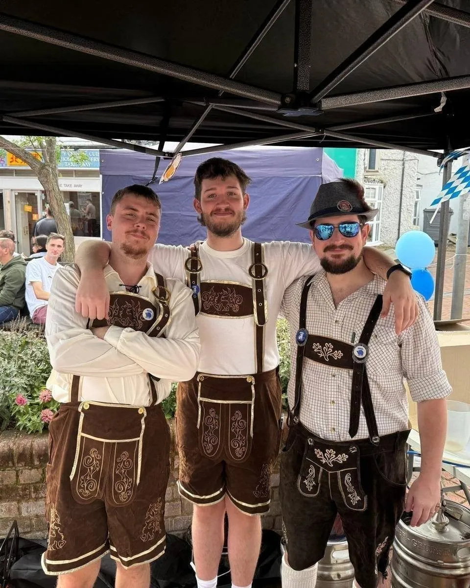 The team in lederhosen for Clocktoberfest