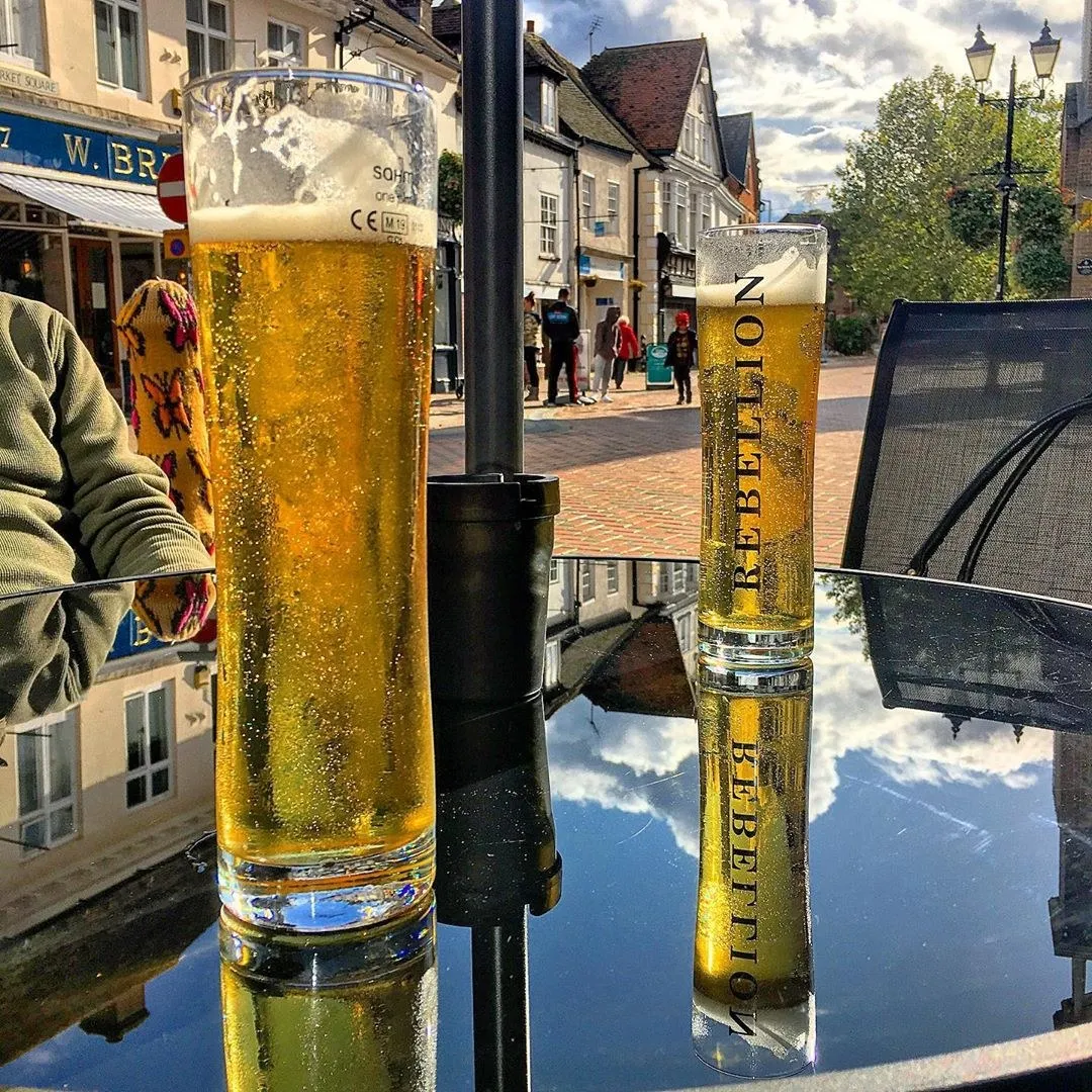 Rebellion pints on an outdoor table